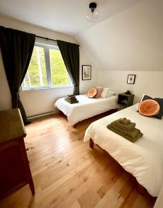 Ένα ή περισσότερα κρεβάτια σε δωμάτιο στο Chalet Le St-Ray +31 φωτογραφίες