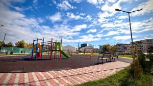 Ο χώρος παιχνιδιού για παιδιά στο Ivory Residence Accommodation - Modern Comfort and Style