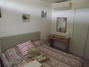 Postel nebo postele na pokoji v ubytování arcachon