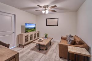 a living room with a couch and a tv at The Ruby 310 By Avada Properties in Pigeon Forge +11 photos