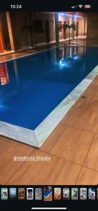 a close up of a swimming pool at Flat camocim 03 residencial Ibiapaba in Camocim
