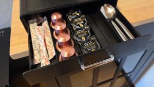 a drawer full of utensils in a box at Privatzimmer Lindlar in Lindlar