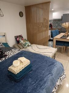 Postel nebo postele na pokoji v ubytování L'océane