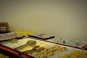 a table filled with different types of cookies and pastries at Hotel Öncü in Istanbul +20 photos
