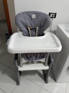 a high chair in a bathroom with a sink at Il mondo di Leo in Tocco da Casauria
