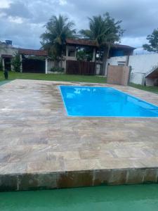 Bazén v ubytování Venham viver dias incríveis nesta Chácara linda! nebo v jeho okolí