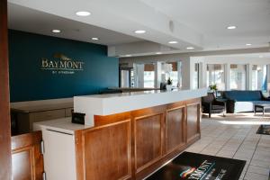 a lobby with a bar in a restaurant at Baymont by Wyndham Howell/Brighton in Howell +19 photos