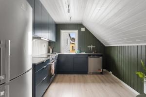 Køkken eller tekøkken på Urban and stylish apartment in city centre