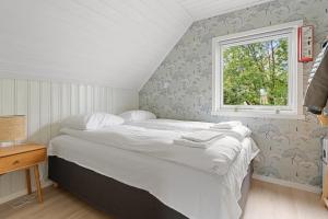 En eller flere senge i et værelse på Urban and stylish apartment in city centre