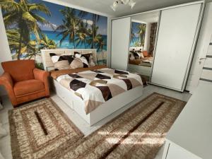 Katil atau katil-katil dalam bilik di Apartament în centru