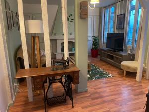 Μια τηλεόραση ή/και κέντρο ψυχαγωγίας στο Appartement champenois