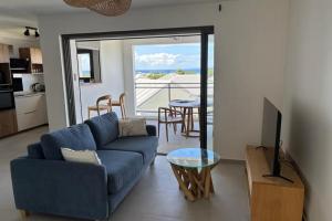 TV a/nebo společenská místnost v ubytování Appartement Azura