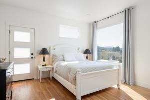 Ένα ή περισσότερα κρεβάτια σε δωμάτιο στο The Perch - Family Friendly! Panoramic Views!