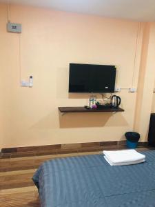 Μια τηλεόραση ή/και κέντρο ψυχαγωγίας στο SS GUESTHOUSE