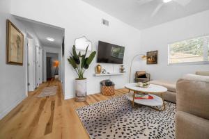 a living room with a couch and a table at Drift & Dream Getaway Relax After Your Adventure with your Family in Crystal River +35 photos