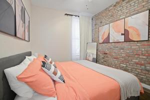 Voodi või voodid majutusasutuse 3 BD Idyllic Haven next to Central Park toas