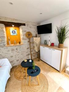 TV a/nebo společenská místnost v ubytování Gîte Casa Liã