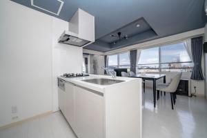 Una cocina o cocineta en Hills Garden Hondori - Vacation STAY 20172