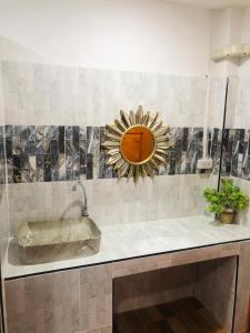 Ένα μπάνιο στο SS GUESTHOUSE