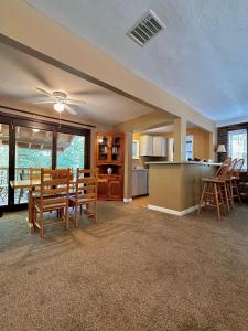 a kitchen and dining room with a table and chairs at Cozy retreat in Woodstock Perfect for Fall Foliage in Woodstock