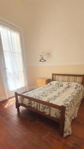 Ένα ή περισσότερα κρεβάτια σε δωμάτιο στο Hotel Cuba