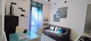 Posezení v ubytování La Gemma di Pisa Appartamento near Cisanello Giardino Privato e Parcheggio e Self Check-in