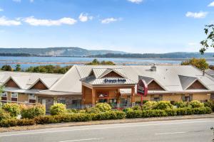 a building with a sign that reads mybury inn at Days Inn by Wyndham Nanaimo in Nanaimo
