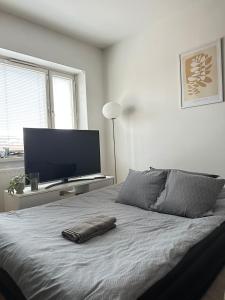 Ένα ή περισσότερα κρεβάτια σε δωμάτιο στο Beautiful studio in the city center