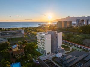 an aerial view of a city with the ocean at Lantern Penthouse in Salerno