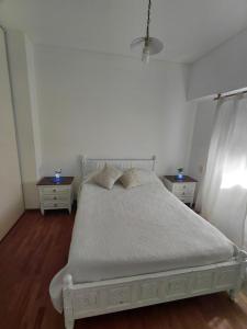 Postel nebo postele na pokoji v ubytování departamento temporal 38 y 13 con cochera para AUTO