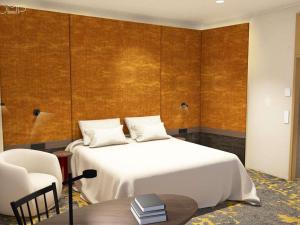 a bedroom with a bed and a table and a chair at Hotel Lycium Debrecen - Handwritten Collection (October 2025) in Debrecen