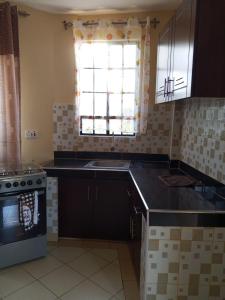 Kuchyň nebo kuchyňský kout v ubytování Coastview Properties + 4 fotografie