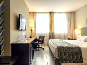 Televisyen dan/atau pusat hiburan di Mercure Salvador Pituba +50 gambar