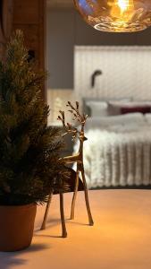 En eller flere senge i et værelse på Luxury City Cottage