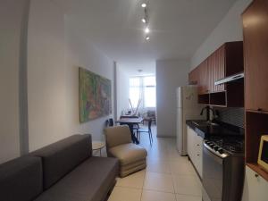 Kuchyň nebo kuchyňský kout v ubytování Home Carijós + 26 fotografií