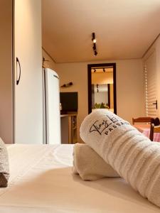 Ένα ή περισσότερα κρεβάτια σε δωμάτιο στο Container Climatizado com deck em frente ao Parque do Passaúna by Tiny House Passaúna