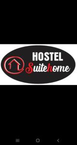 a sign that says hostel shuttleorne on a skateboard at Hostel Suite Home in Saquarema