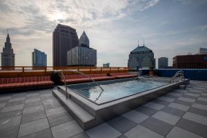a hot tub on the roof of a building at Luxury Apt In The Heart Of The Theater District in Cleveland