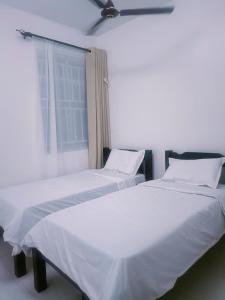 Voodi või voodid majutusasutuse Sharz loft - Ganjoni Mombasa toas