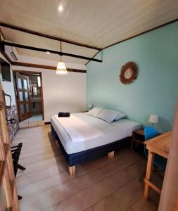 Postel nebo postele na pokoji v ubytování Hotel Tropical