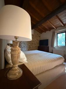 Postel nebo postele na pokoji v ubytování Torre di Masana