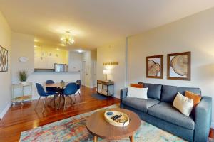 a living room with a couch and a table at Belltown Escape in Seattle