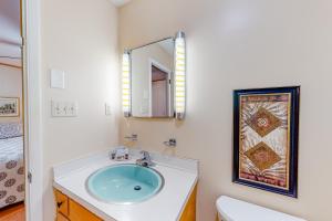 a bathroom with a sink and a mirror at Morris Villa Upper in Lake Junaluska +24 photos