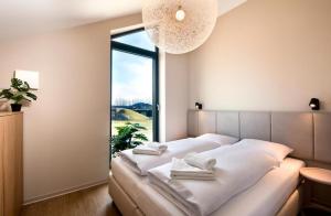 Ένα ή περισσότερα κρεβάτια σε δωμάτιο στο TatryHome - Veľká Lomnica
