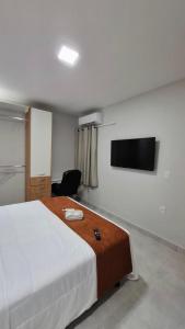 Televisyen dan/atau pusat hiburan di Apartamento aconchegante e completo COP30 -PROXIMO AO AEROPORTO