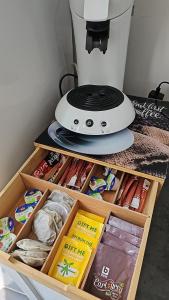 a coffee maker sitting on top of a table at Appartement diamant in Brussels
