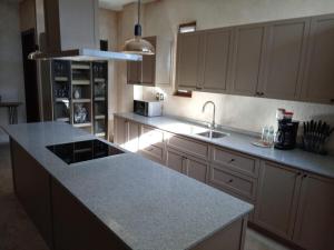 a kitchen with a sink and a counter top at Loft Dolce Vita in Santeagueda