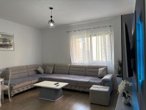 Posezení v ubytování Mme apartment