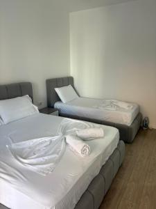 Postel nebo postele na pokoji v ubytování Mme apartment
