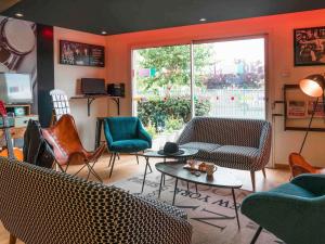 Khu vực ghế ngồi tại Ibis Styles Toulouse Blagnac Aéroport